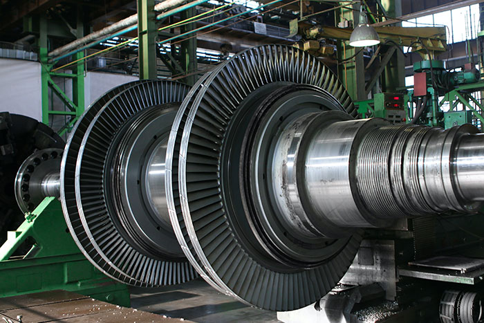 Large turbine component in production in special machine construction - complex mechanical engineering system and precise machining of industrial components in the context of change management and production